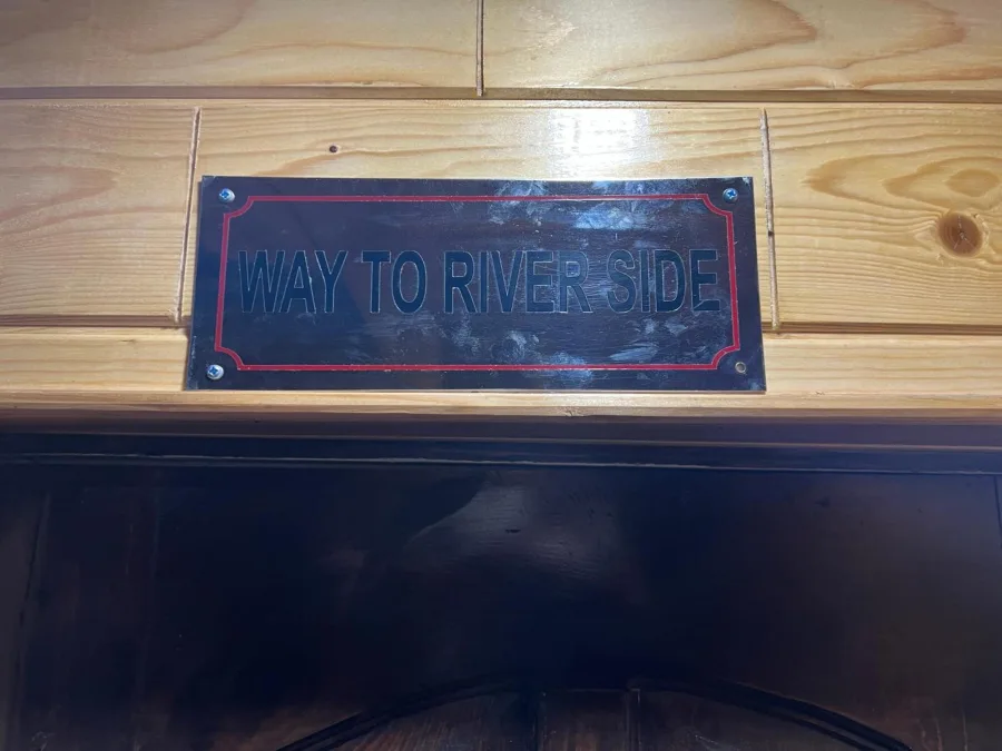 Sign reading Way to River Side at Hotel Seven Pahalgam
